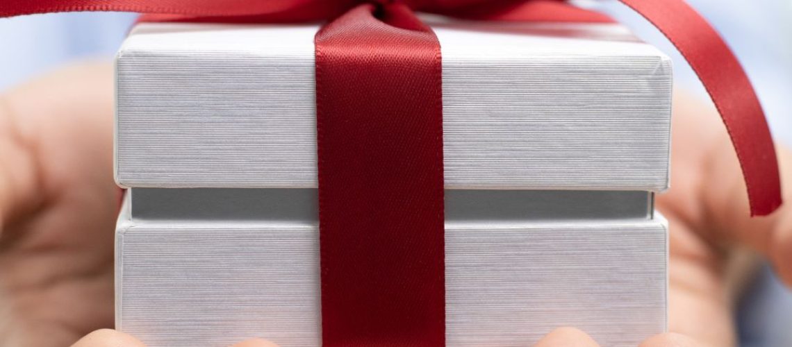 Untitled design (2) Gift presented to someone. Red Ribbon